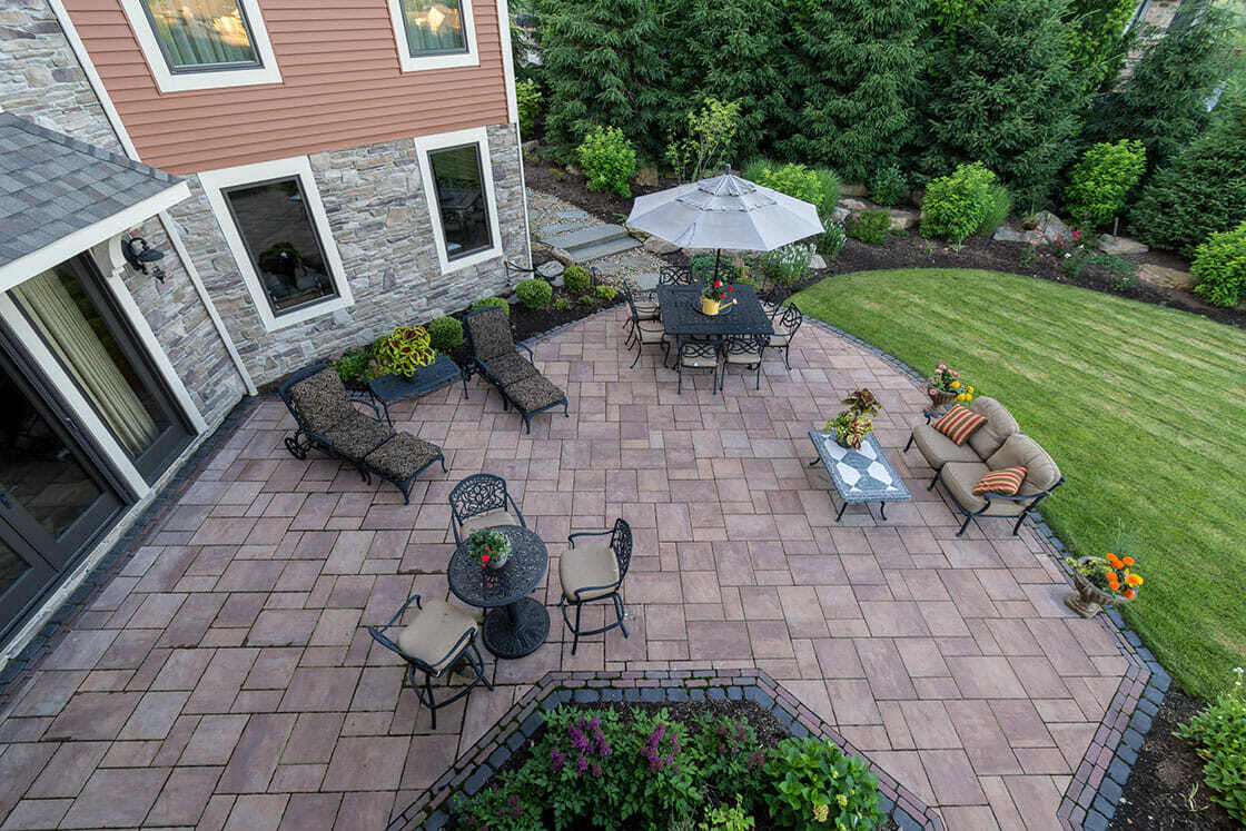 Custom patio and walkway installation in Bainbridge, OH for a functional outdoor space