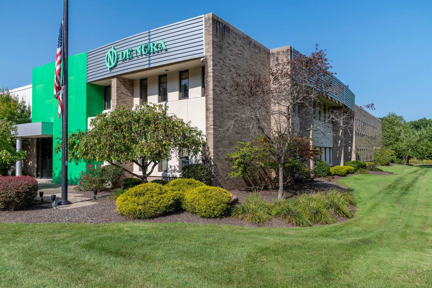 High-end HOA landscape maintenance with lush greenery in Chagrin Falls, OH