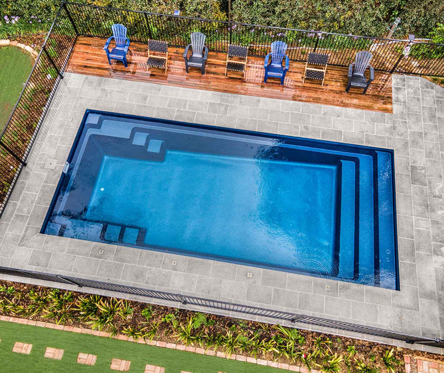 Elegant backyard pool with water features in Hudson, OH enhancing outdoor luxury
