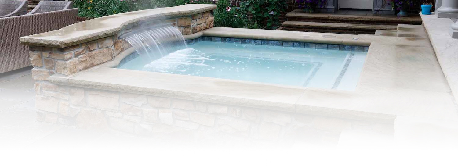 Elegant spa with heated water and stone surround in Aurora, OH