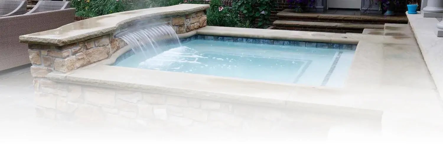 Elegant spa with heated water and stone surround in Aurora, OH