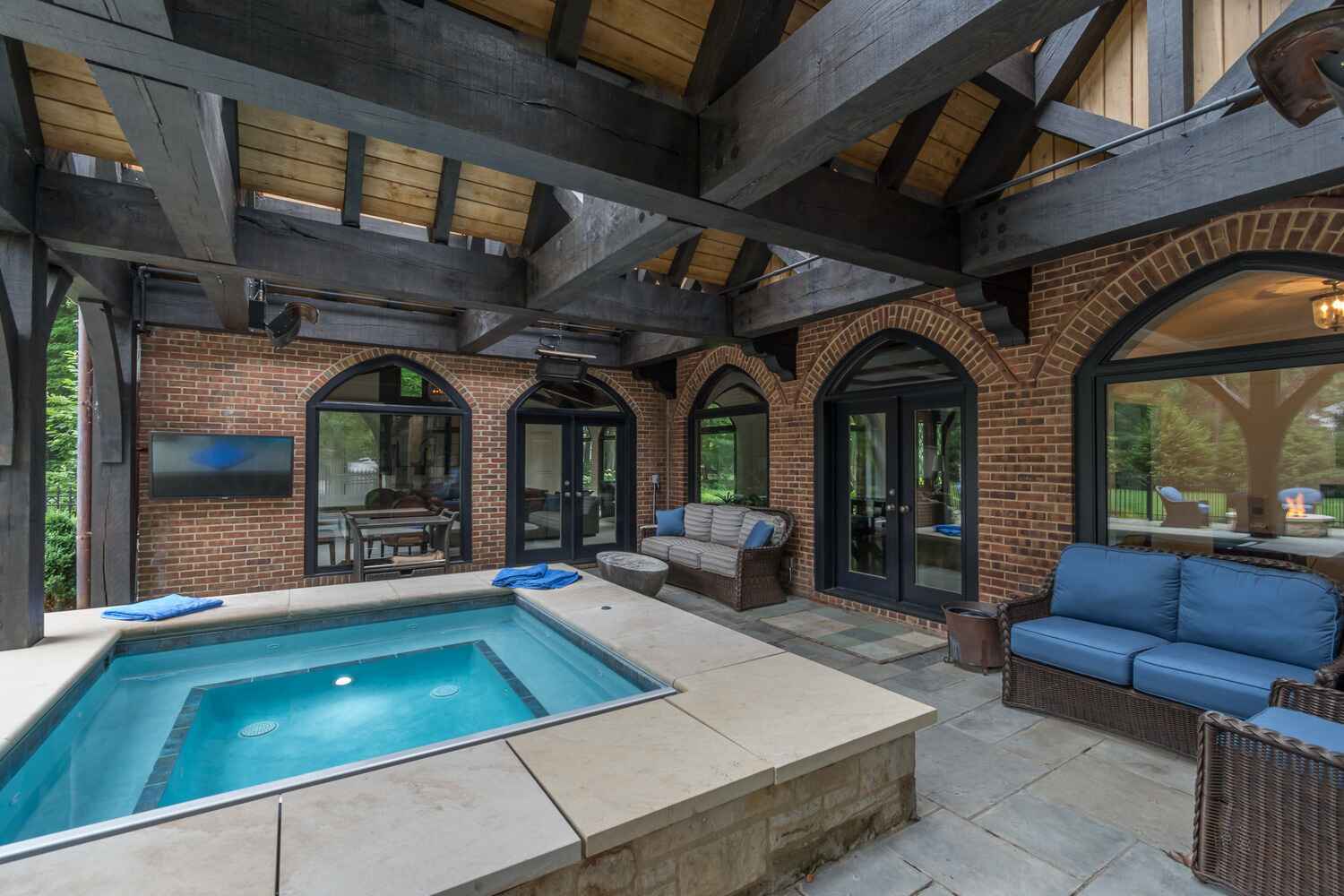Custom-built spillover spa in Moreland Hills, OH for the ultimate backyard retreat
