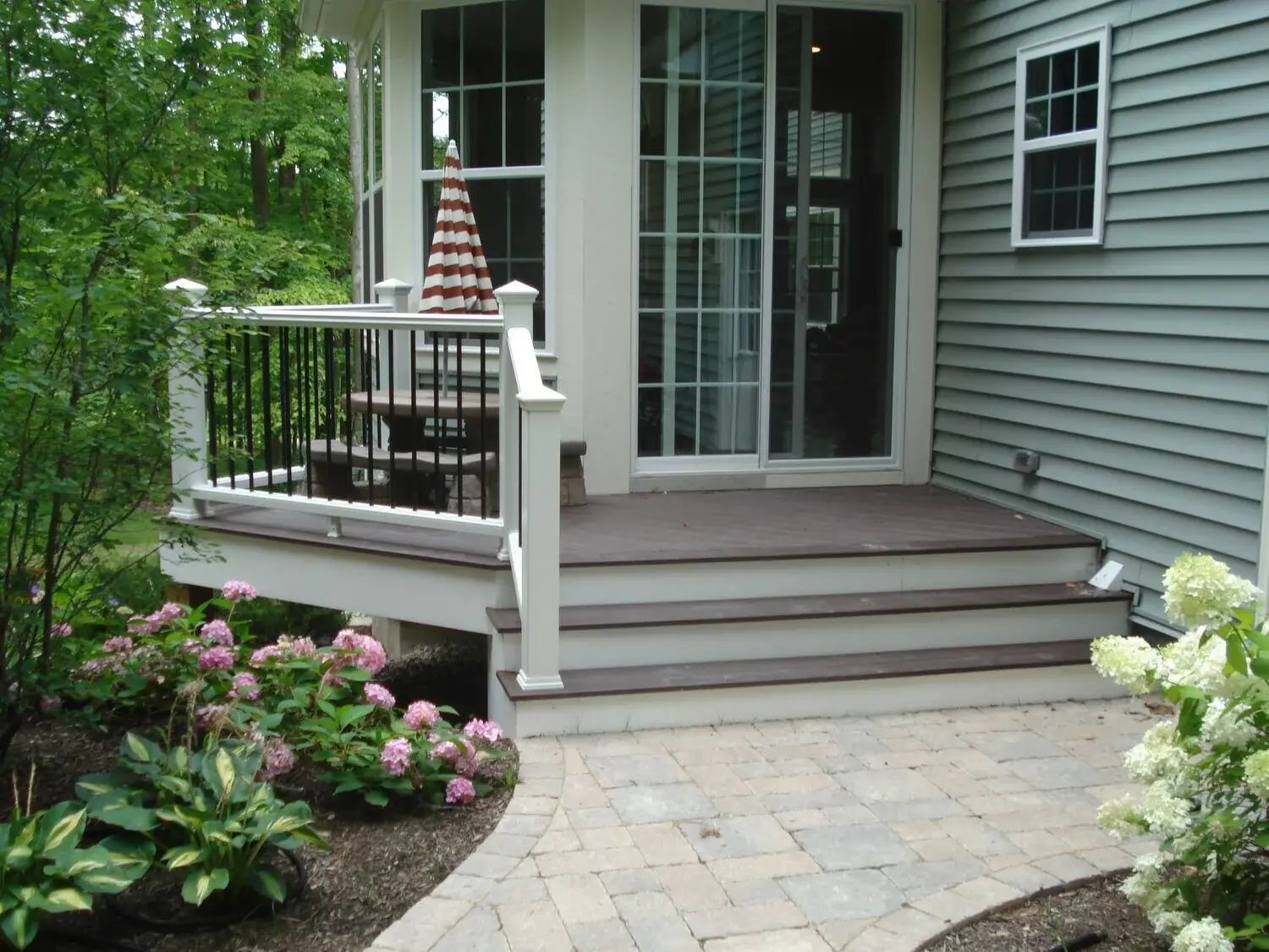 Custom-crafted wood deck with outdoor kitchen in Solon, OH