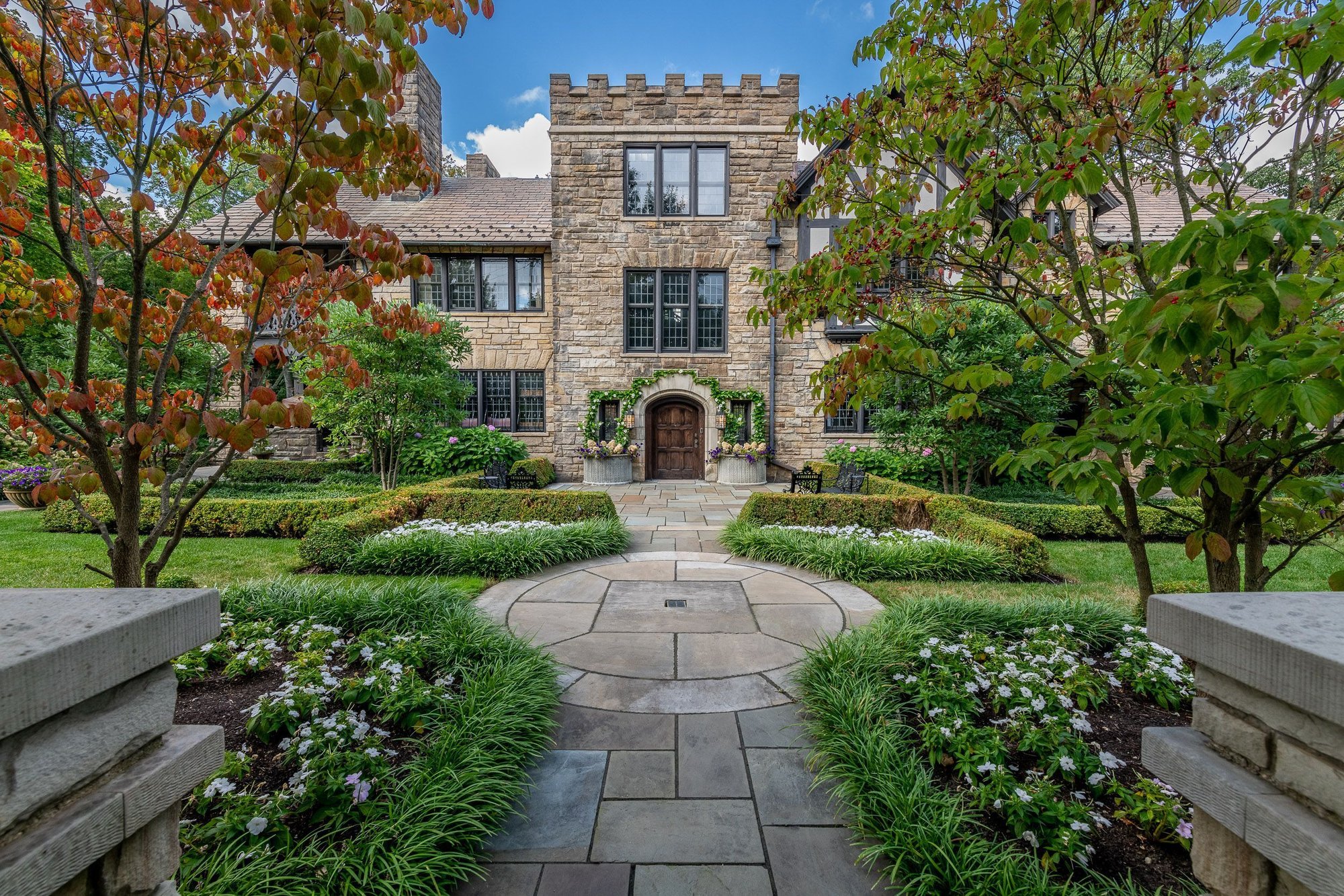 Well-maintained lawn increasing residential property value in Northeast Ohio neighborhood.