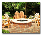 Brick fire pit by Exscape Designs