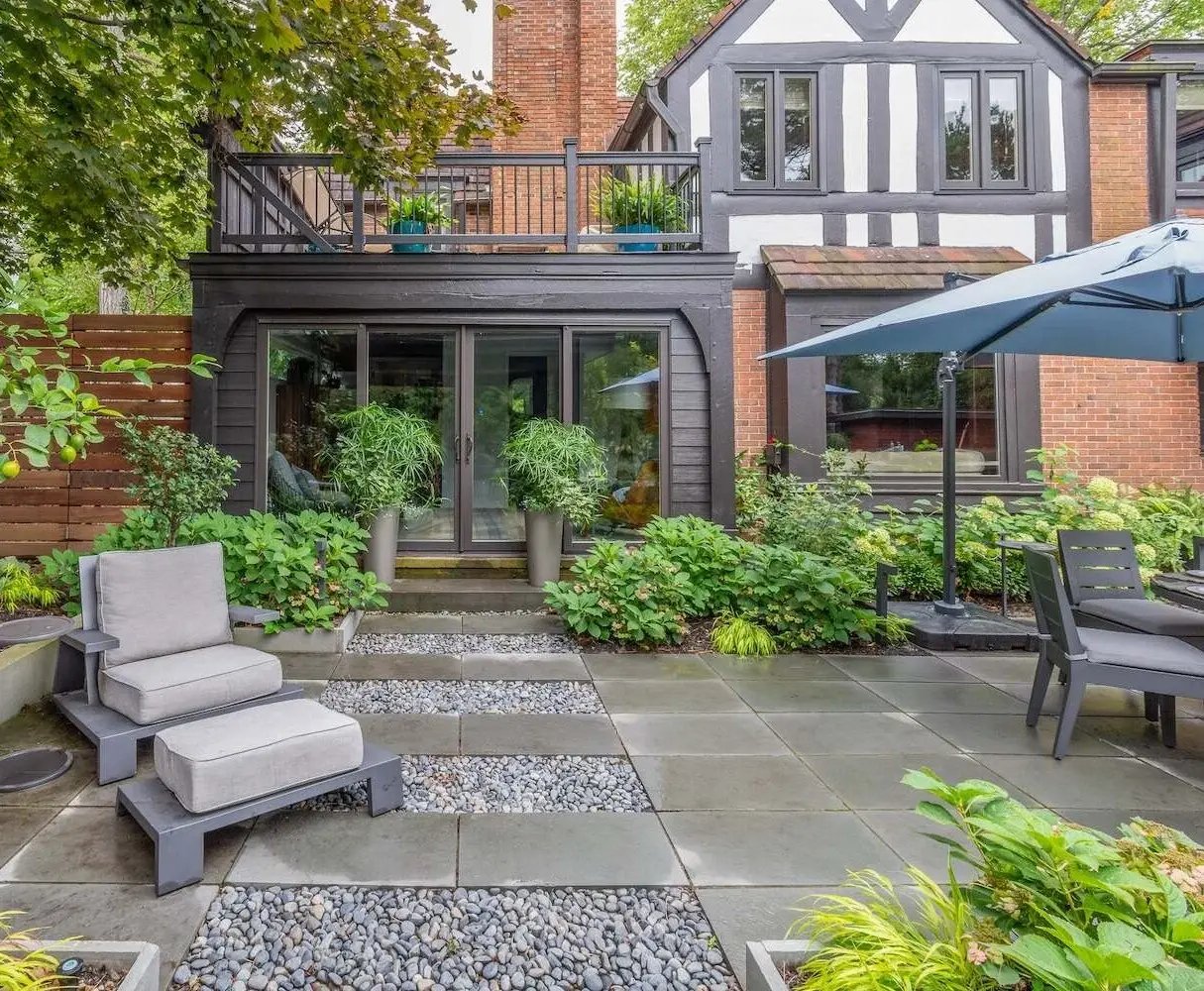 Lush garden beds with colorful seasonal flowers enhancing a backyard in South Russell, OH-1