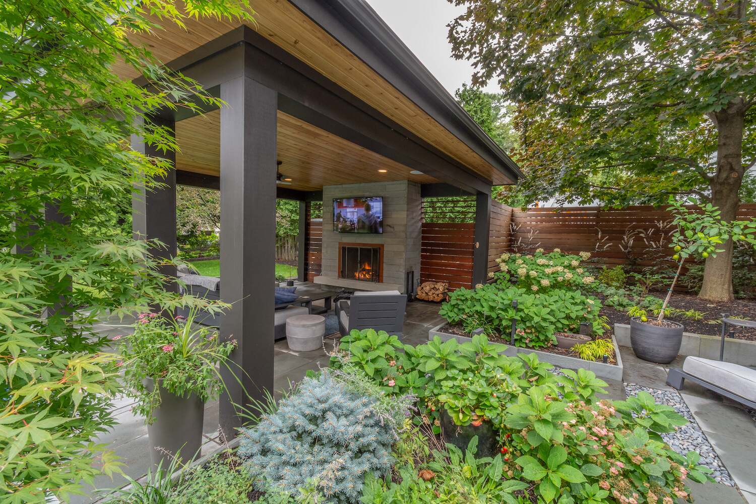 Lush garden beds with colorful seasonal flowers enhancing a backyard in South Russell, OH
