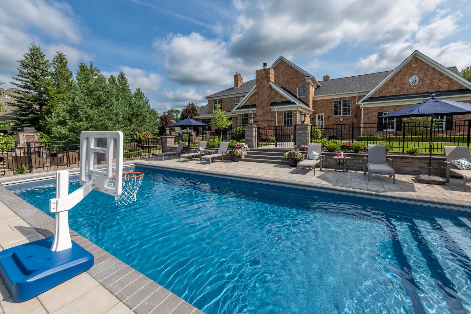 Luxury custom pool featuring a sleek tiled waterline in Cleveland, OH
