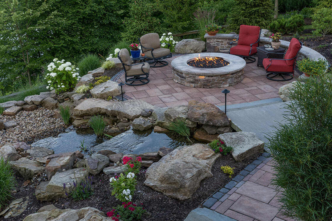 Neatly edged planting beds adding structure and color to a backyard in Gates Mills, OH (1)