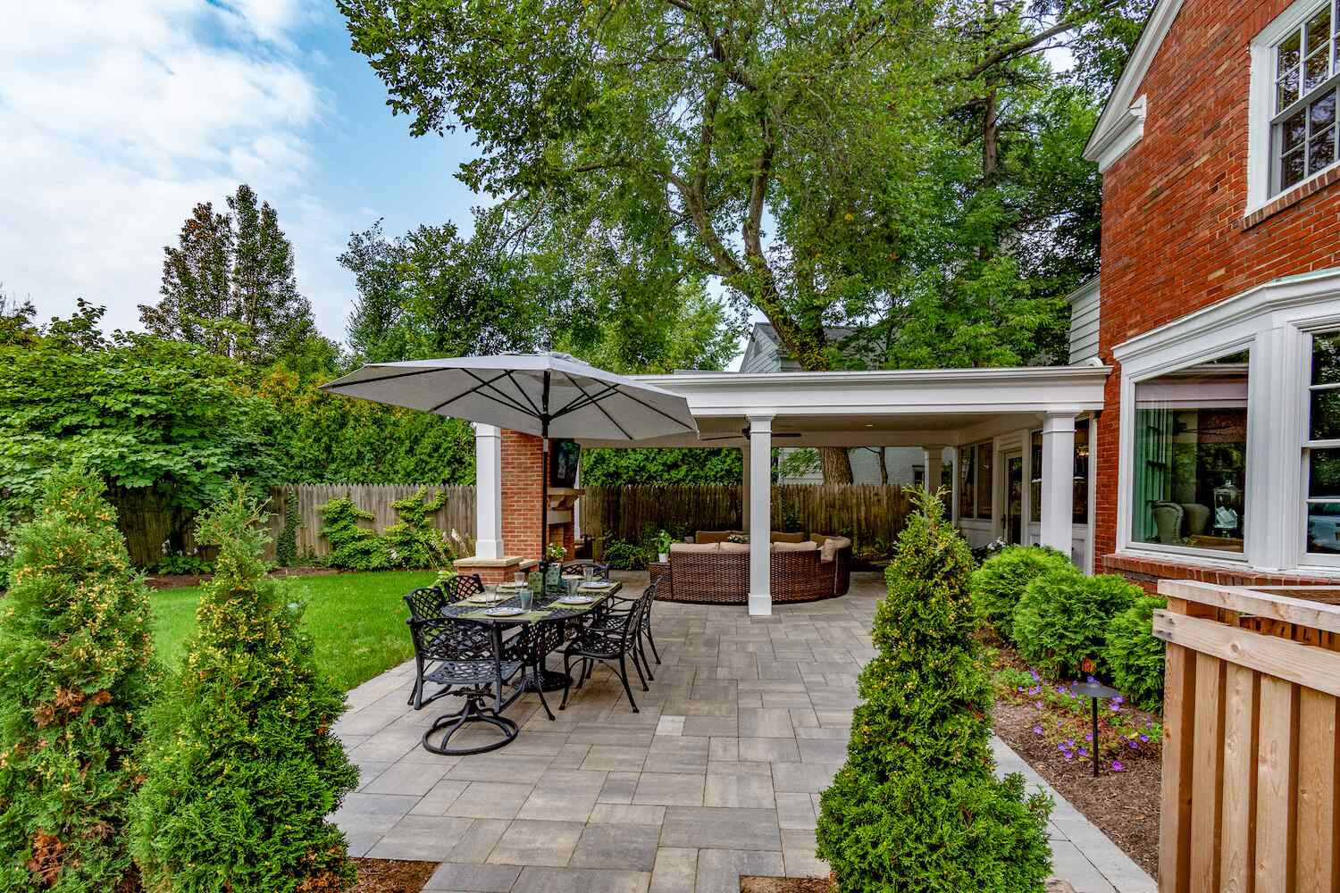 Outdoor entertainment space with custom paver patio in Moreland Hills, OH