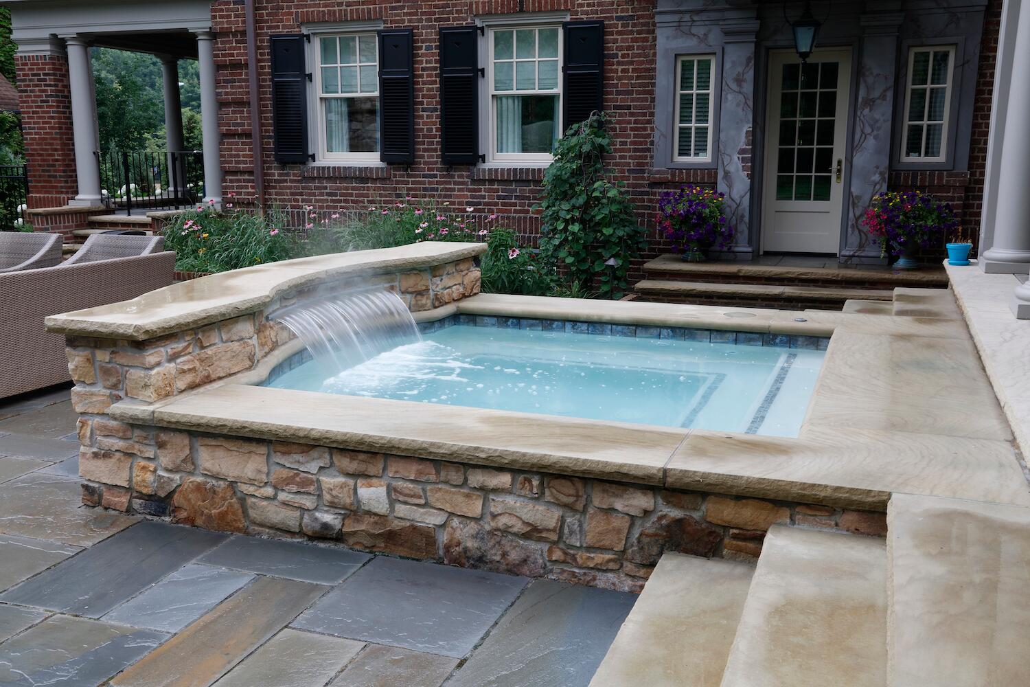 Outdoor fountain installation in Pepper Pike, OH as a sophisticated landscape centerpiece