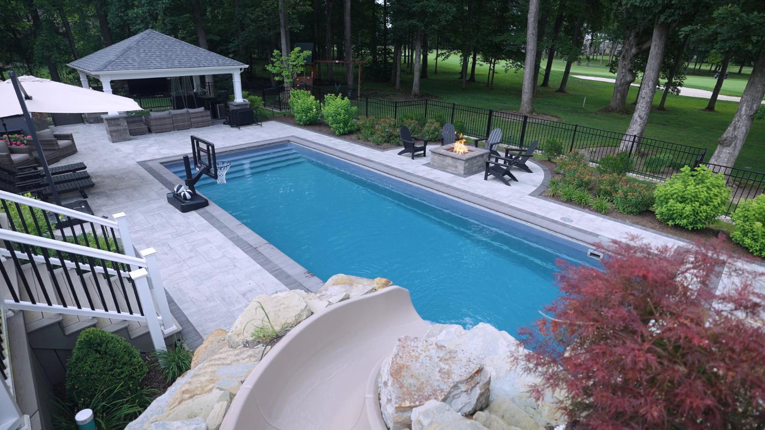 Poolside fire feature creating an evening gathering space in Ohio