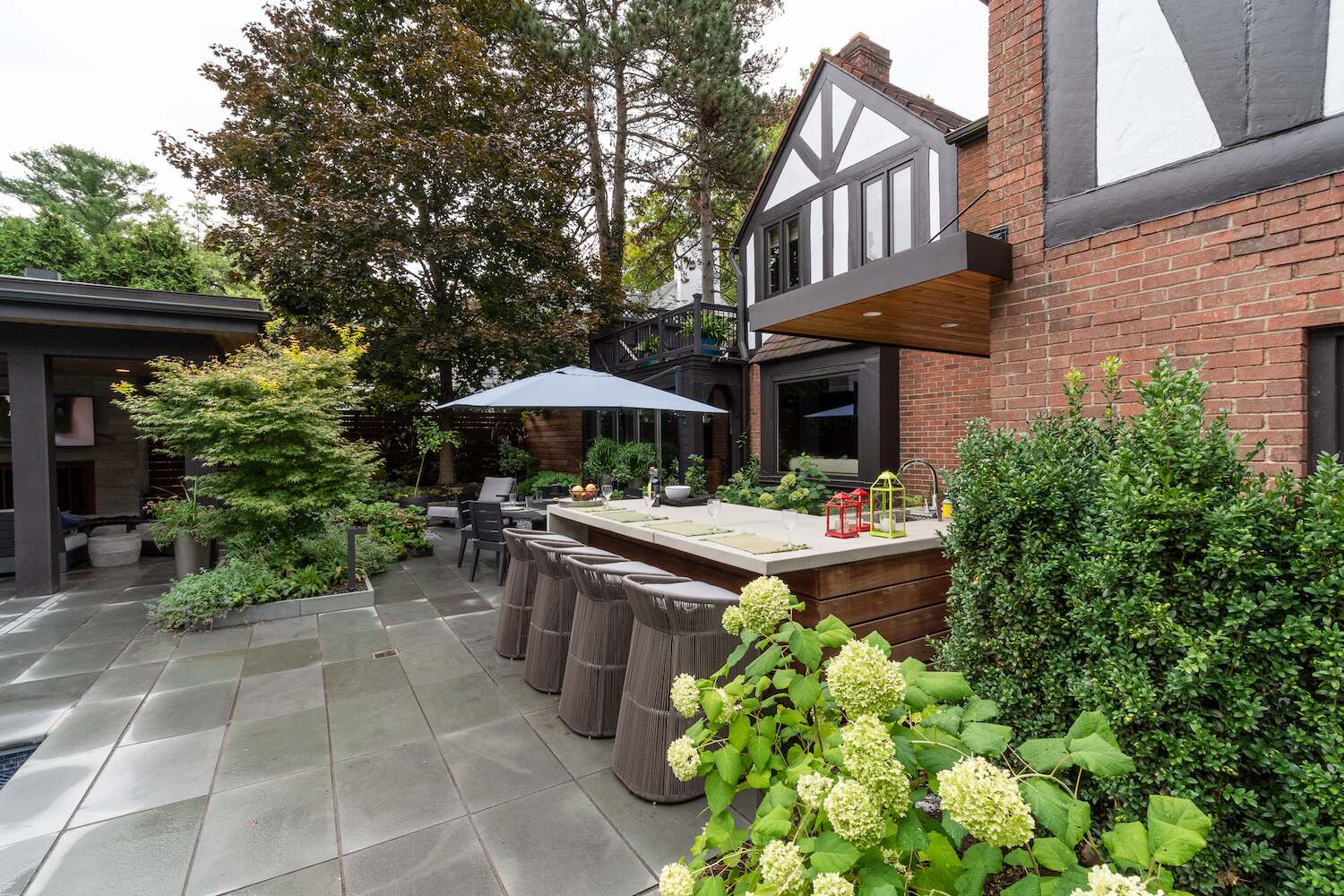 Thoughtfully designed multi-level backyard with pool, pavilion, and garden beds in Beachwood, OH Thoughtfully designed multi-level backyard with pool, pavilion, and garden beds in Beachwood, OH